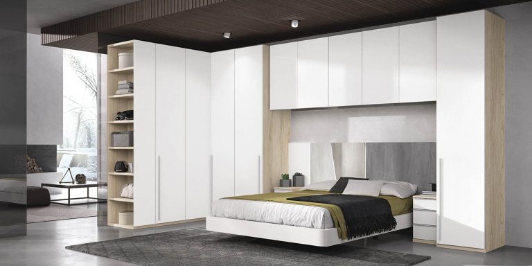 Dormitorio cabecero mesitas bancada armario rinconero puente – Home Dreams Design